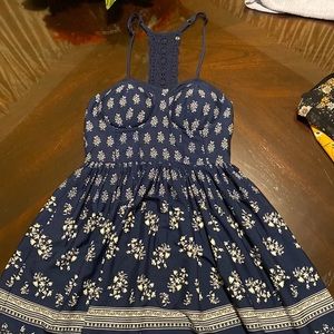 By aeropostales and it has padding you don’t need a bra it’s in size S